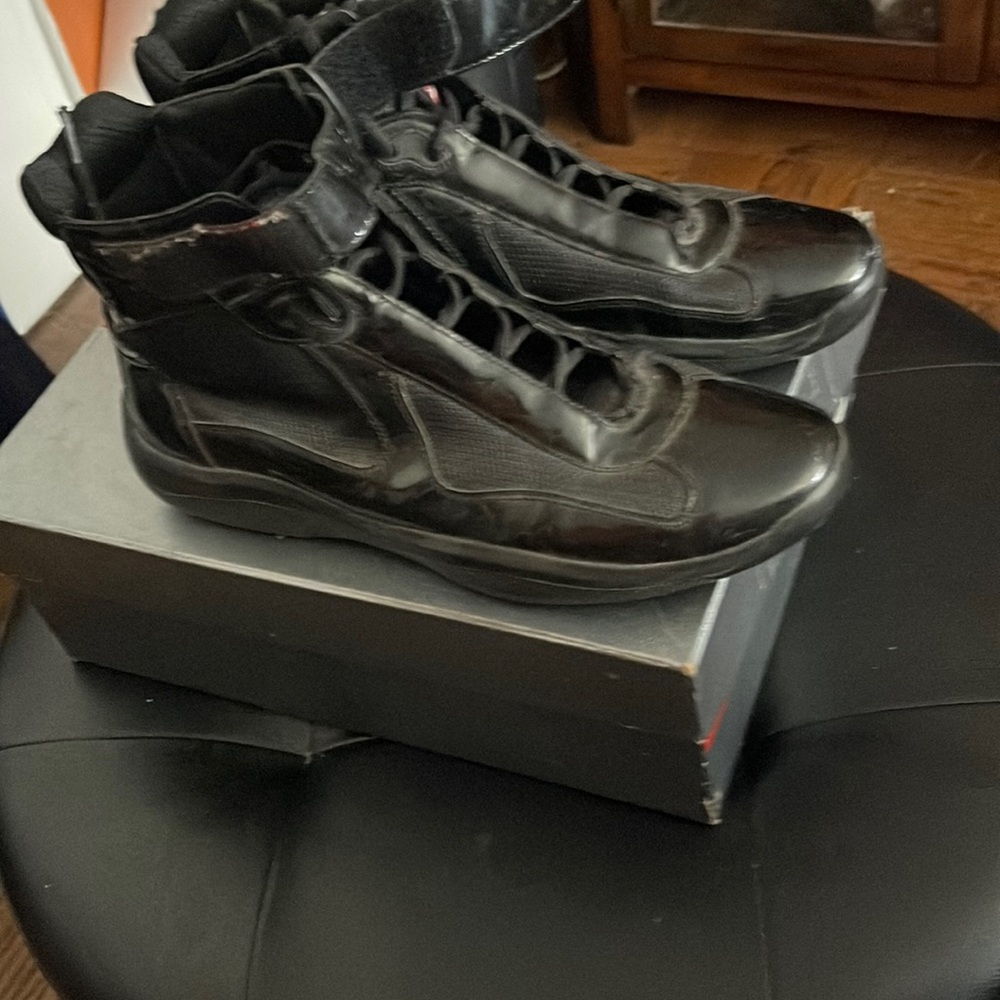 Black patent leather pradas high top